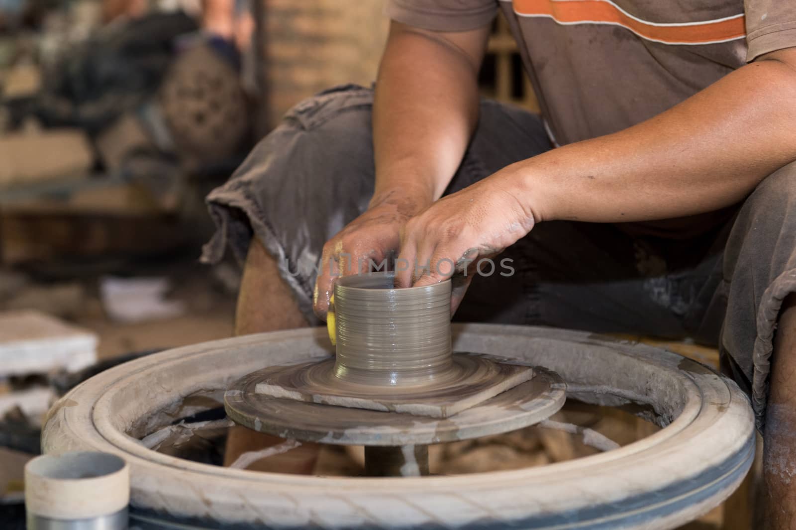 Closeup of sculptor man hand with him job