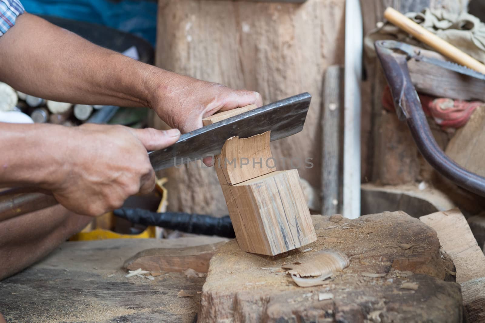 closeup of sculptor man with him job