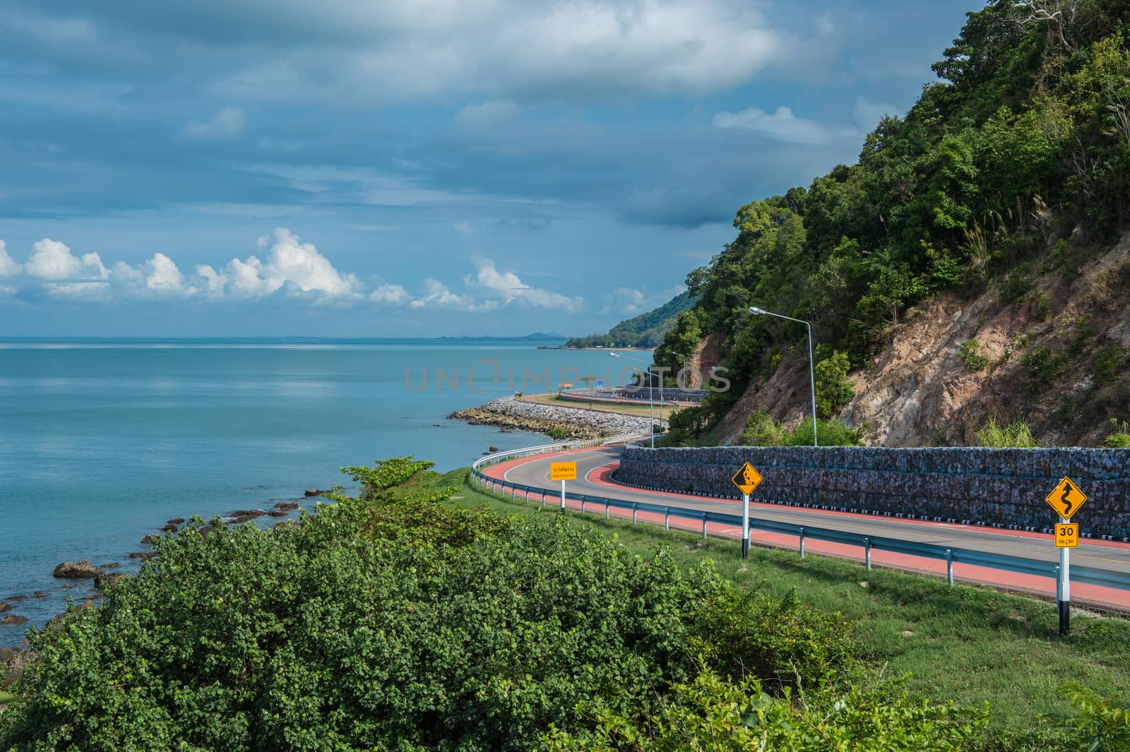 Curve of coast road with mountain and sea, Nang Phaya hill sceni by sayhmog