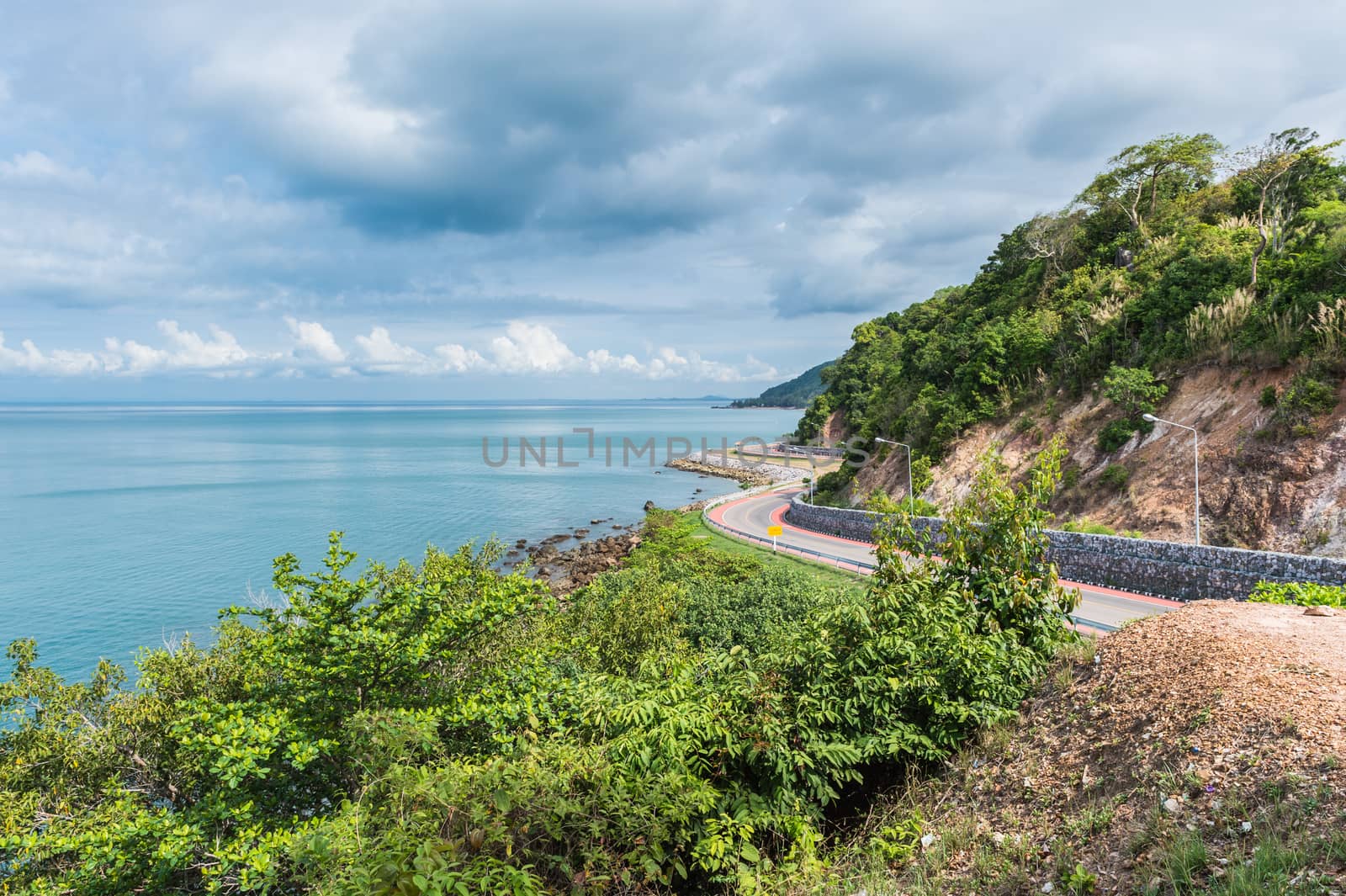 Curve of coast road with mountain and sea, Nang Phaya hill scenic point