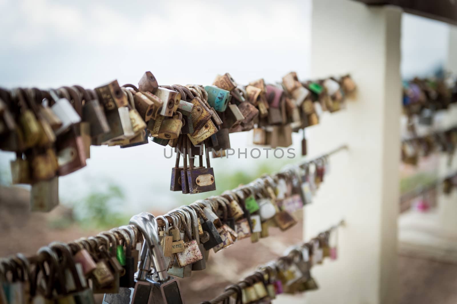 Closeup of grunge padlock, promise for love concept by sayhmog