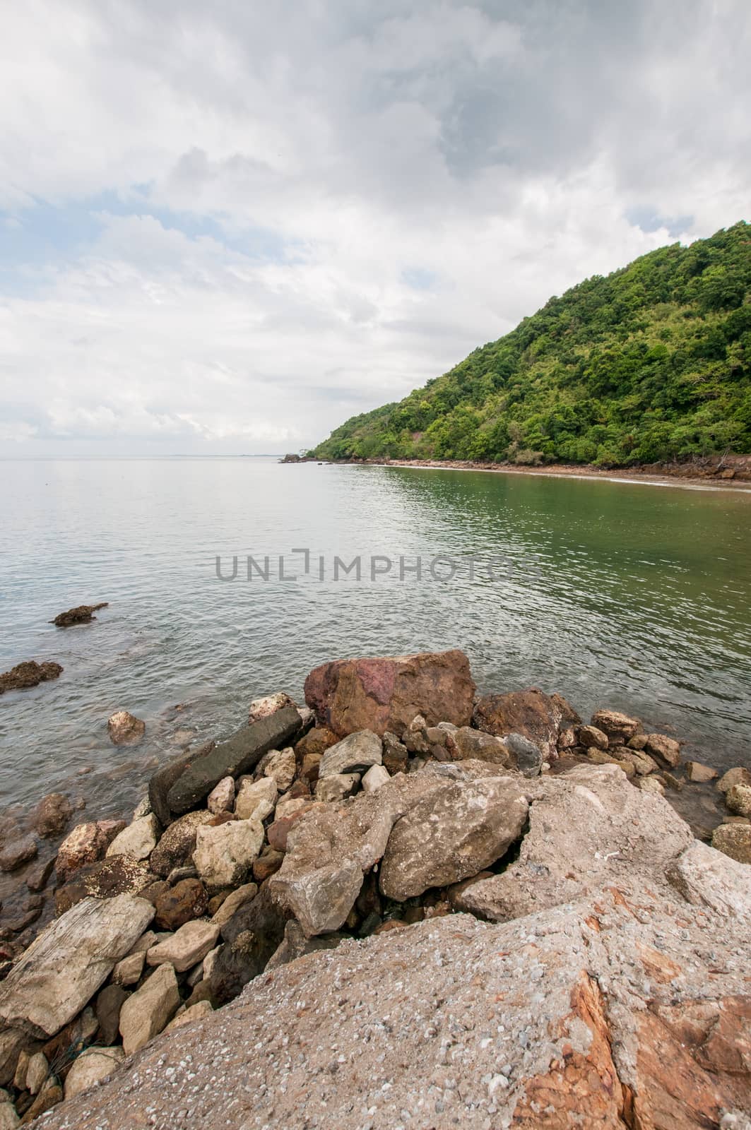 Landscape of beach and sea with mountain