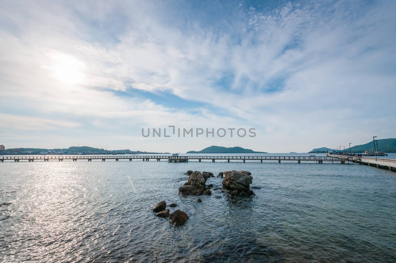 Landscape of rock in the ocean with bridge