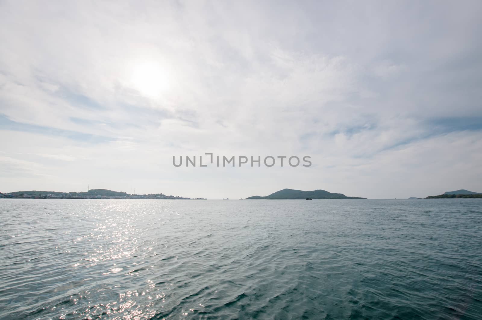 Seascape with sunset and mountain landscape