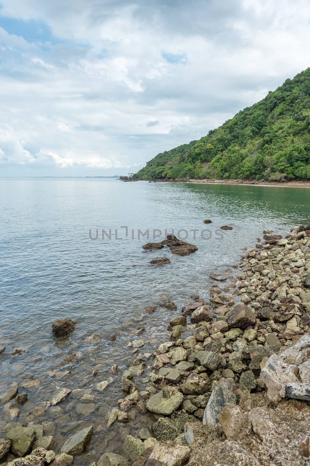 Landscape of beach and sea with mountain