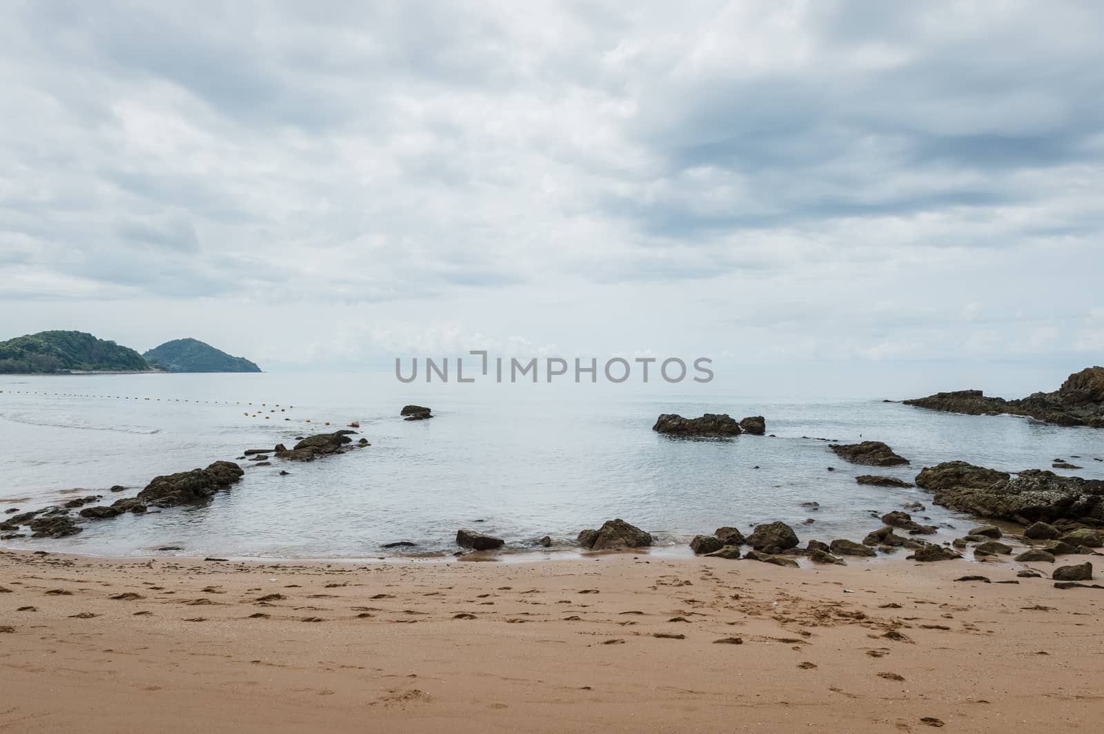 Landscape of sea beach with clouds sky