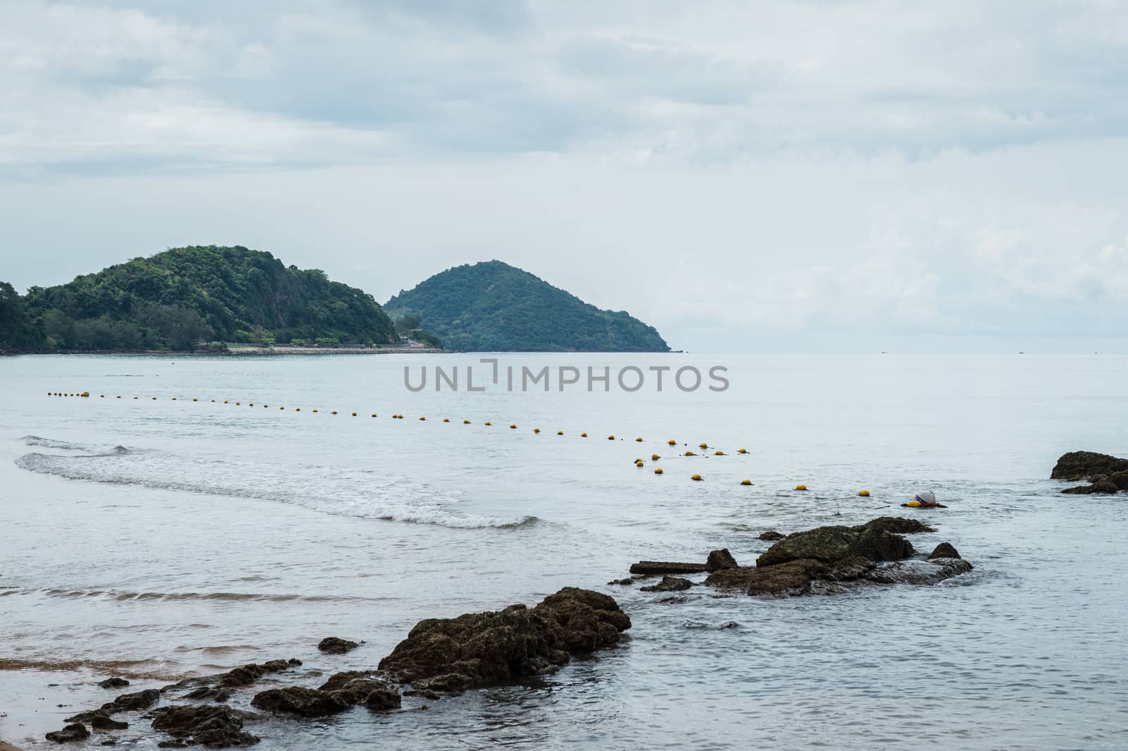 Landscape of sea beach with clouds sky