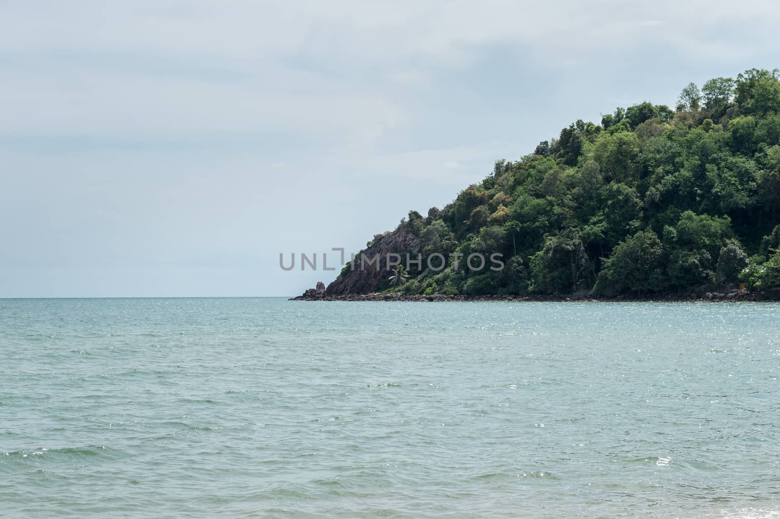 Closeup of island on the ocean landscape by sayhmog
