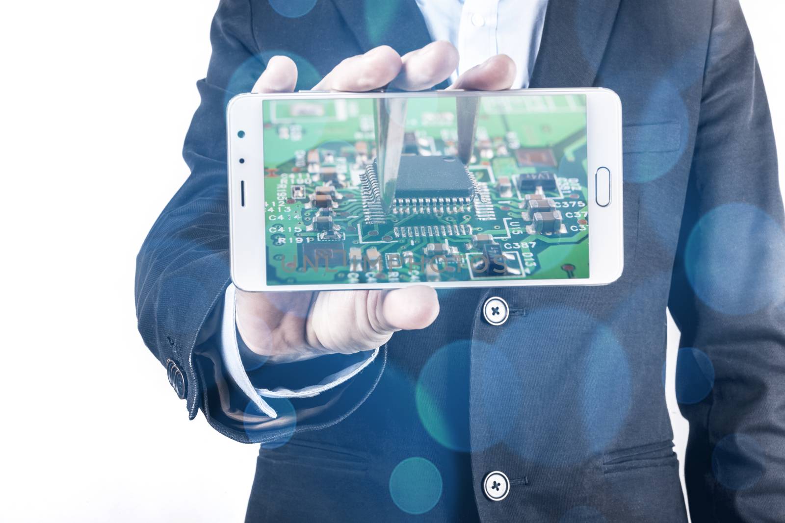 Smartphone in hand isolated on white background