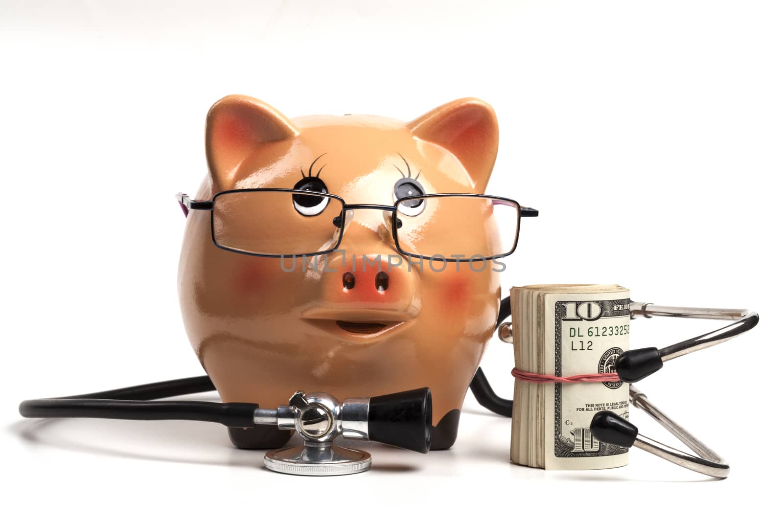 Cute Piggy Bank With Black Stethoscope and Dollars Roll Banknotes Isolated on White Background