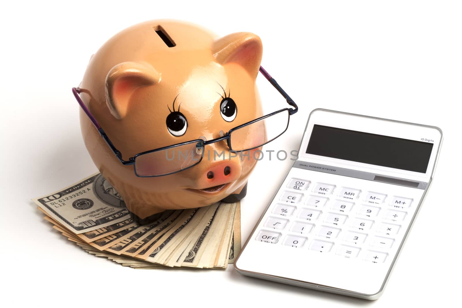 Piggy Bank With Dollars Roll and Calculator Isolated on White Background