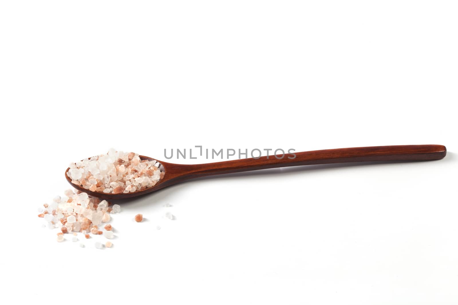 Himalayan Salt Raw Crystals Pile with Brown Wood Spoon Isolated on White Background