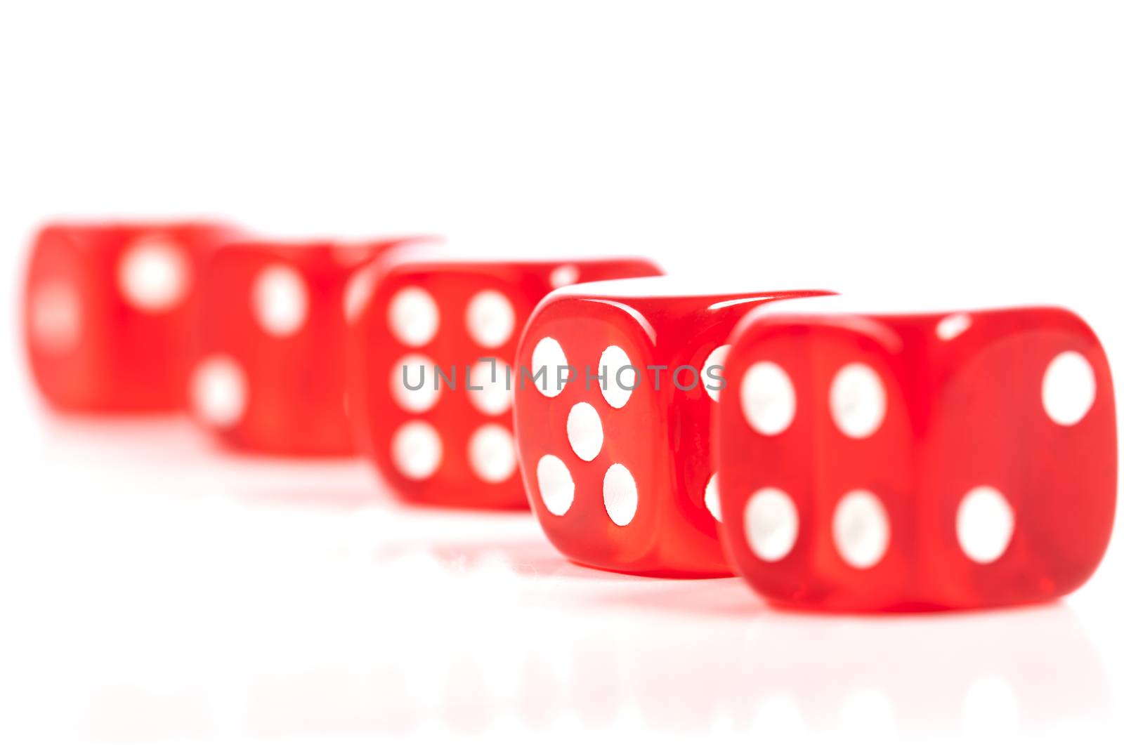 Red Casino Dice Row Focus on Five Isolated on White Bckground