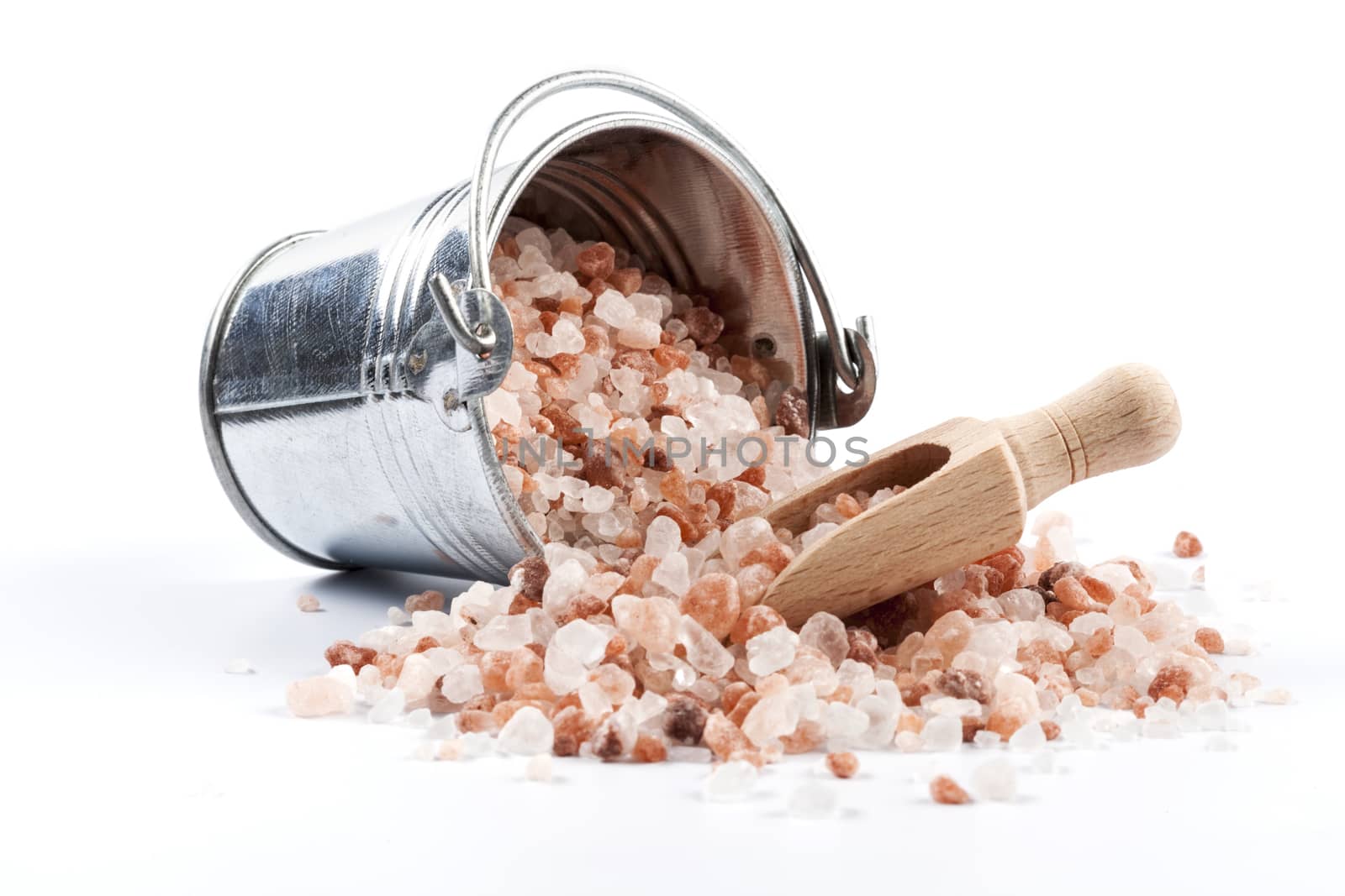 Himalayan Salt Raw Crystals Pile in Silver Metal Bucket Isolated on White Background