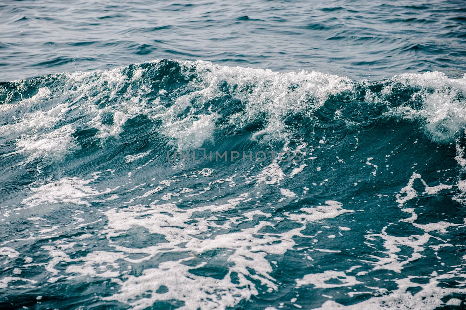 Closeup of ocean wave for background by sayhmog