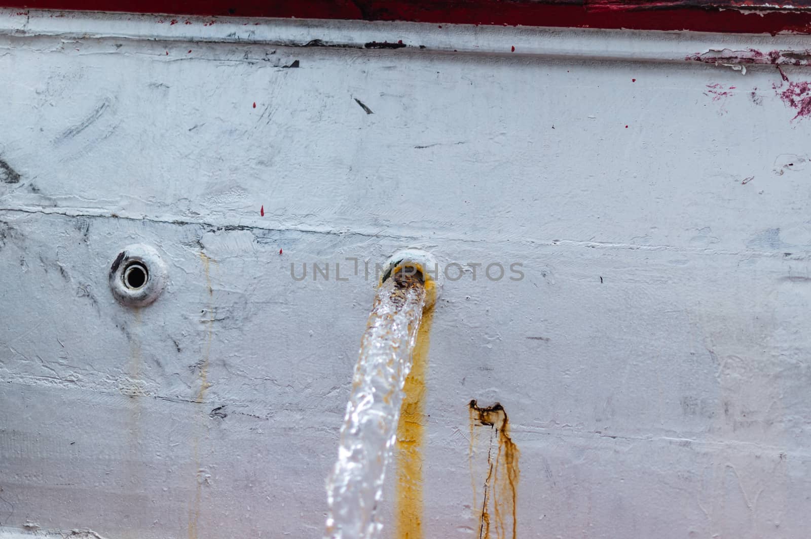 Closeup of hole drainage on the boat by sayhmog