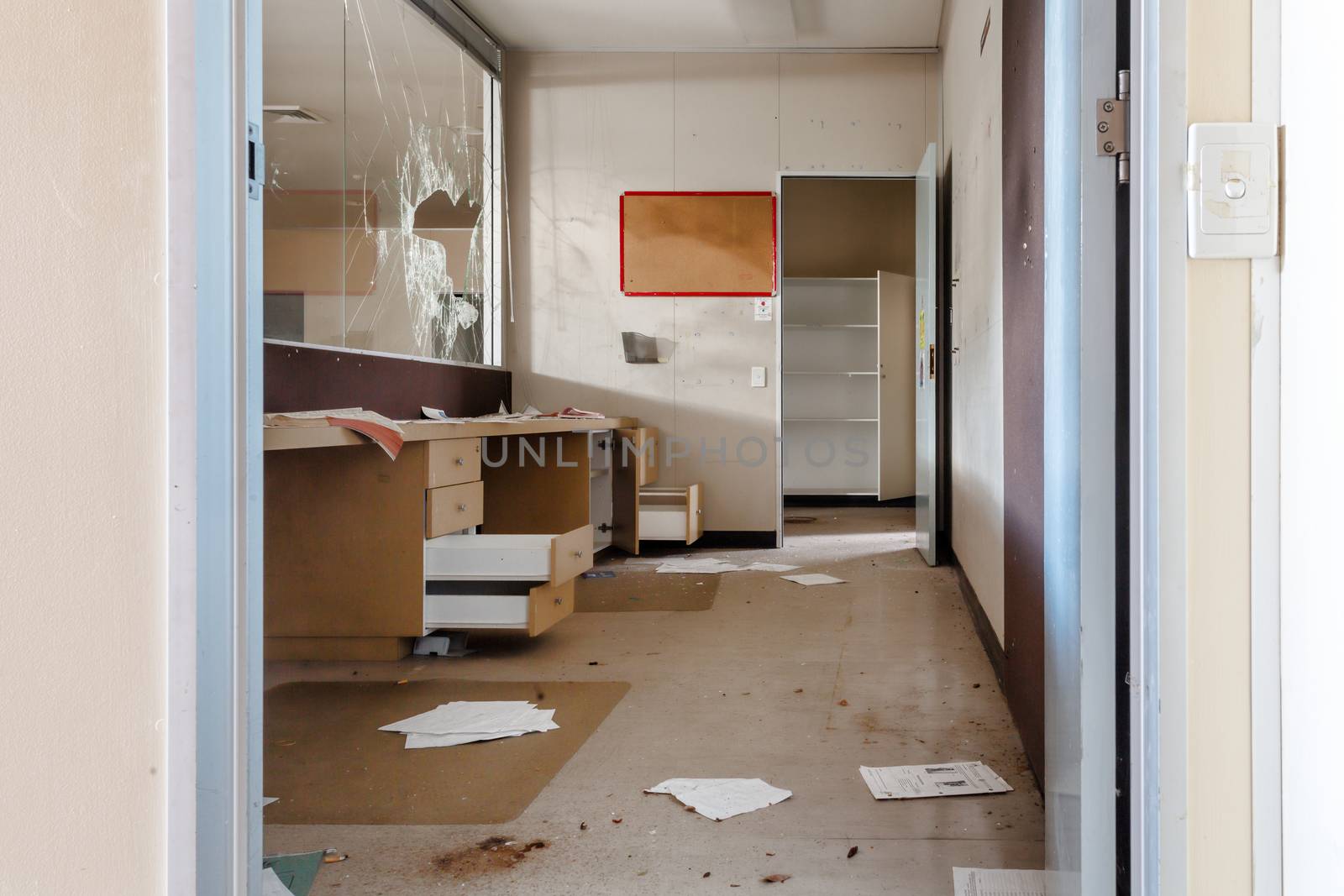 Vandalised office reception area of abandoned building by lovleah