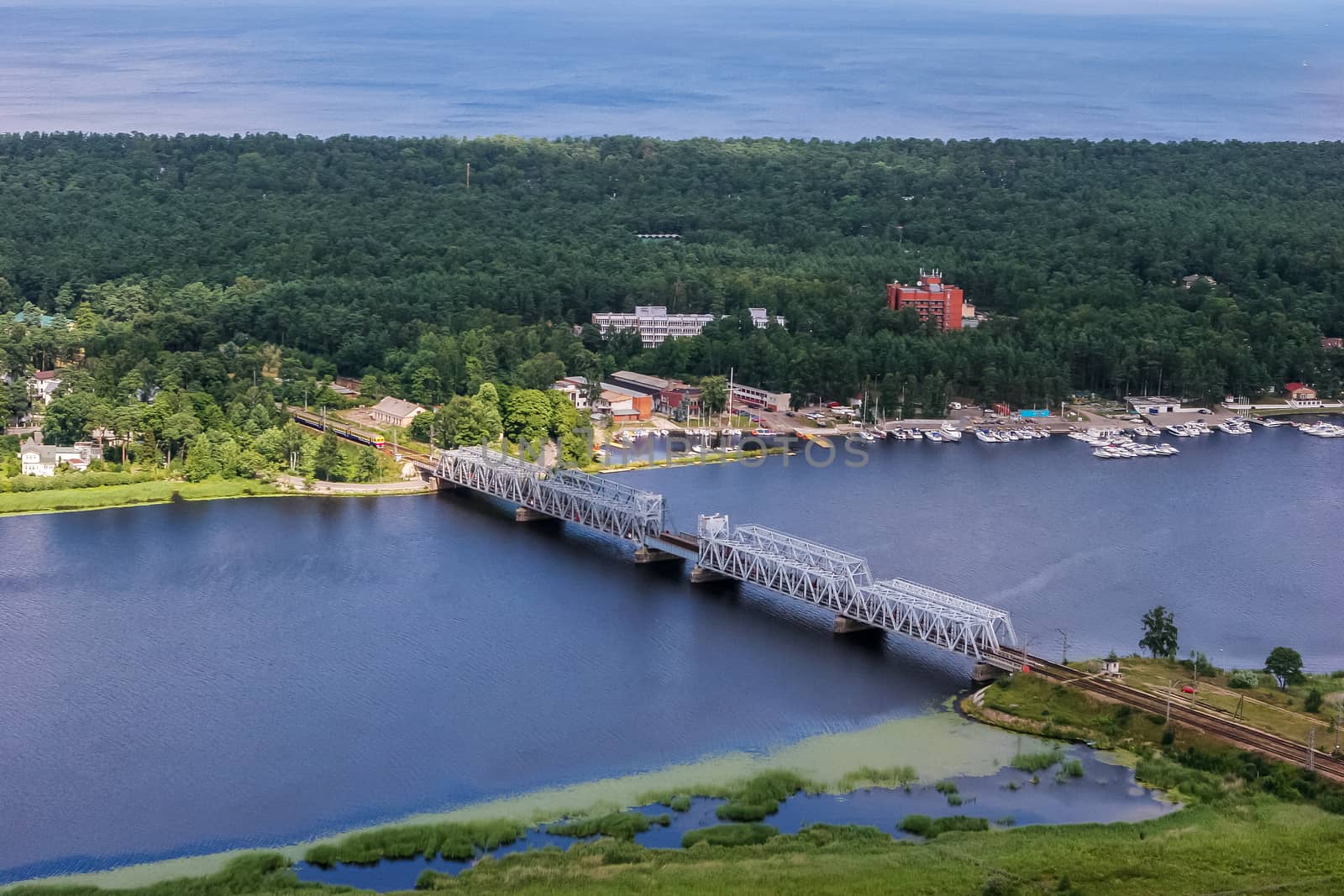 Aerial view of river Lielupe. Jurmala from above. Aerial view of river Lielupe railway bridge in Latvia.