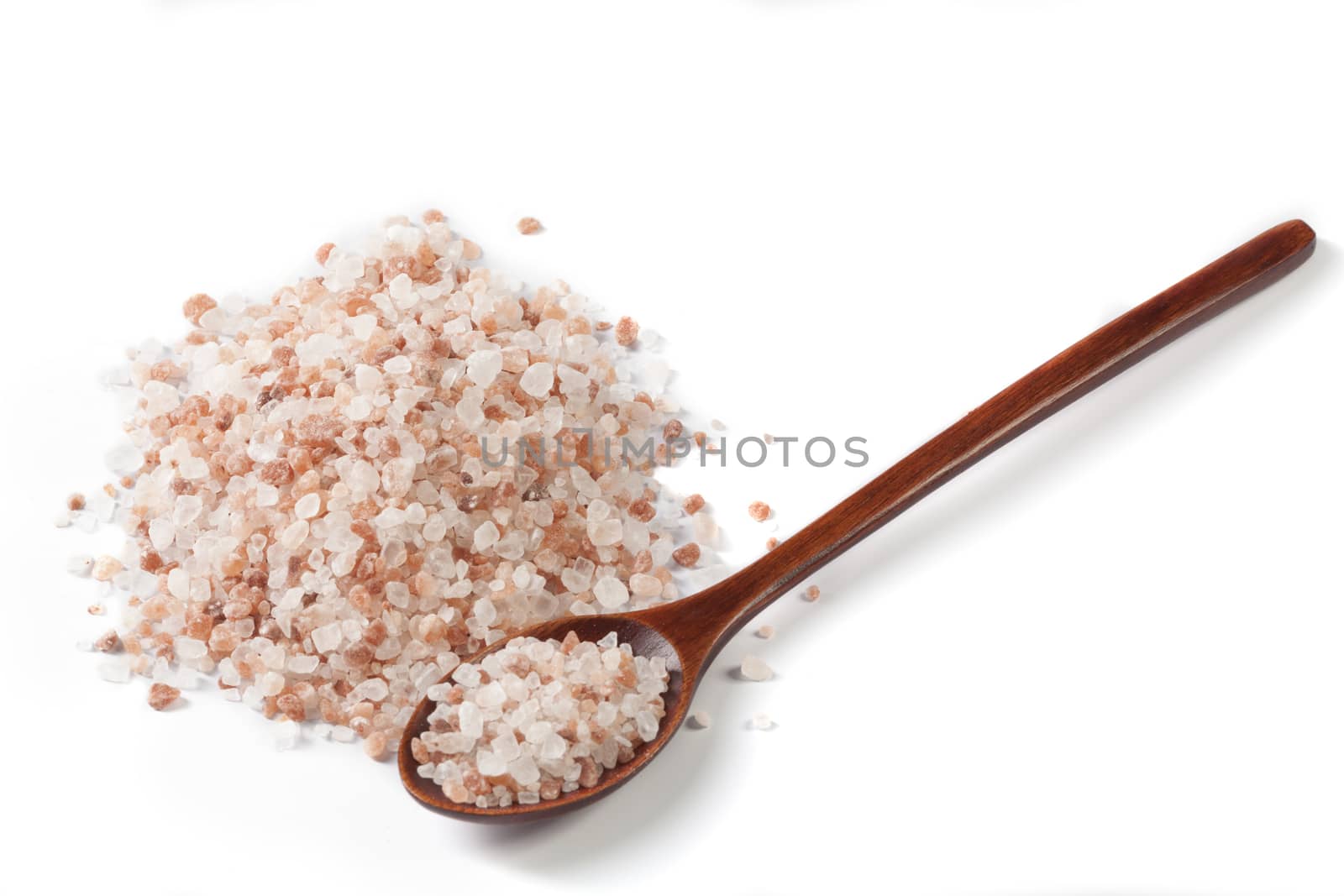 Himalayan Salt Raw Crystals Pile with Brown Wood Spoon Isolated on White Background