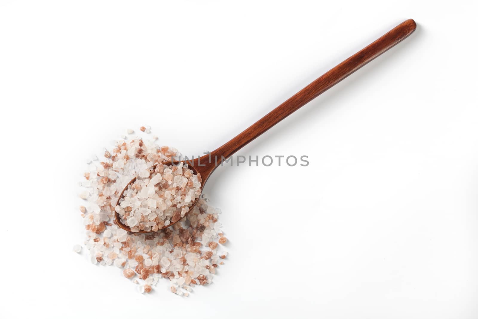 Himalayan Salt Raw Crystals Pile with Brown Wood Spoon Isolated on White Background