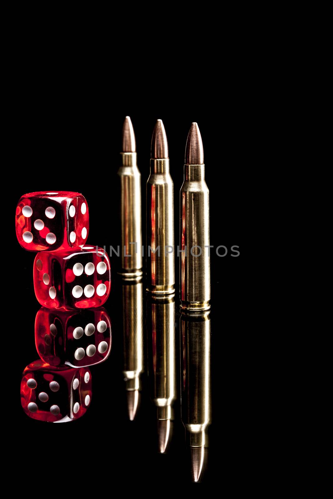 Bullets isolated on black background with reflexion