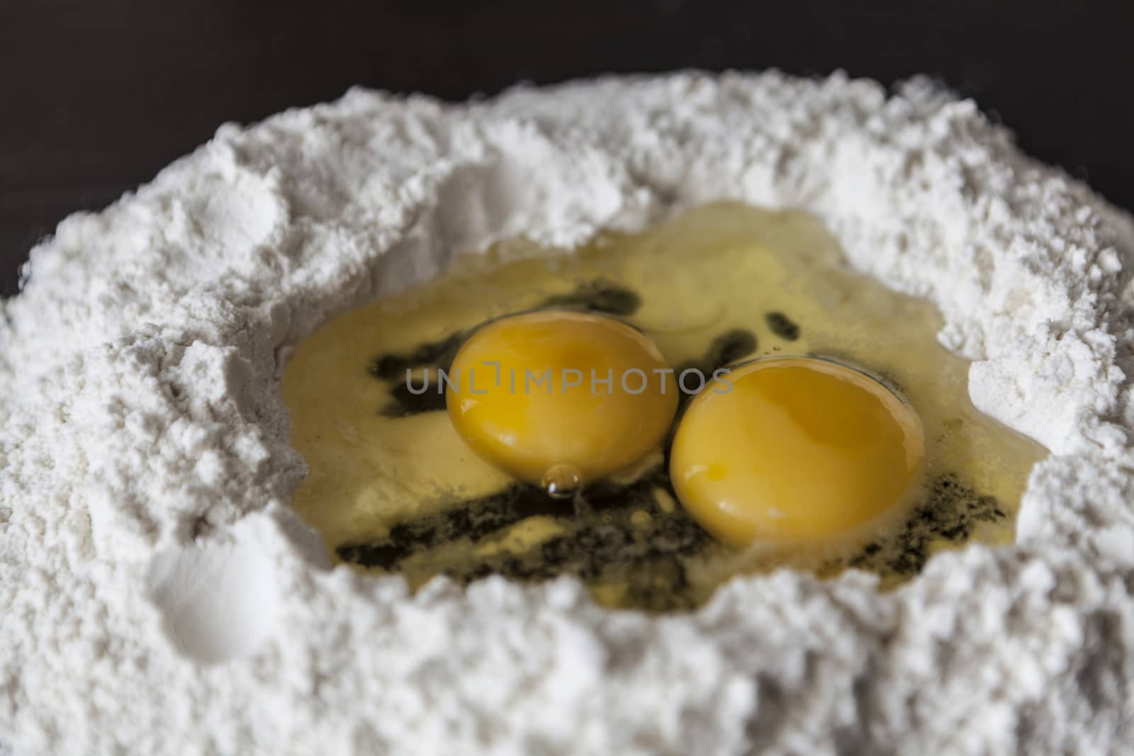 Making homemade pasta with flour and eggs