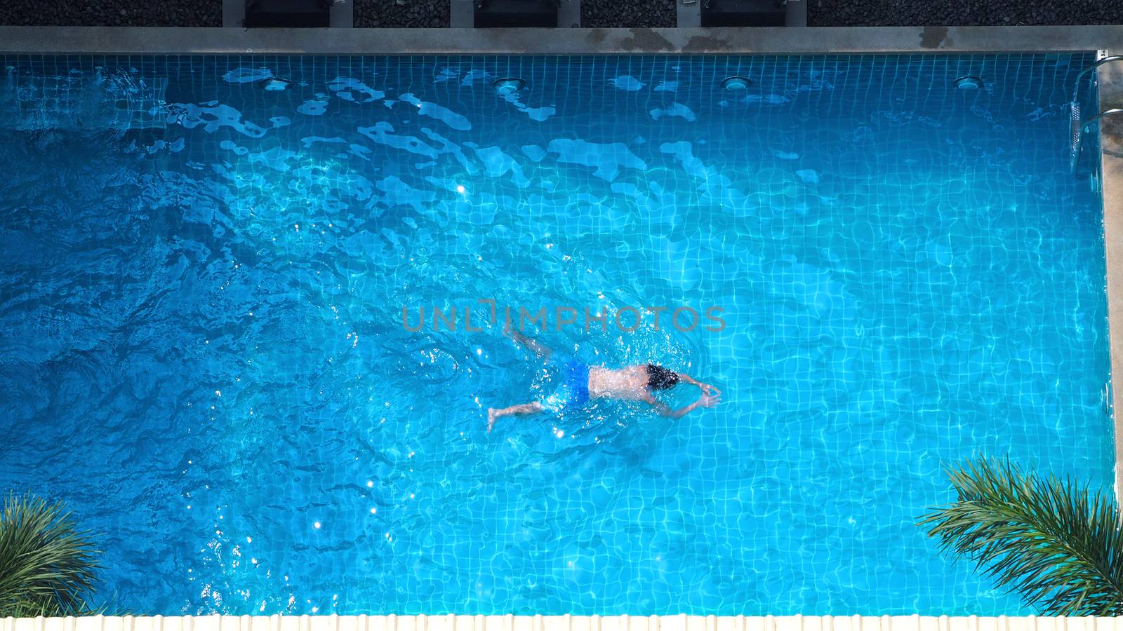 Top view images of swimming pool in summer season by gnepphoto