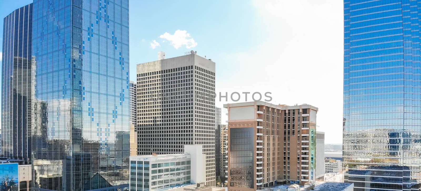 Panorama aerial view of downtown Dallas, Texas during sunny autumn day with colorful fall foliages