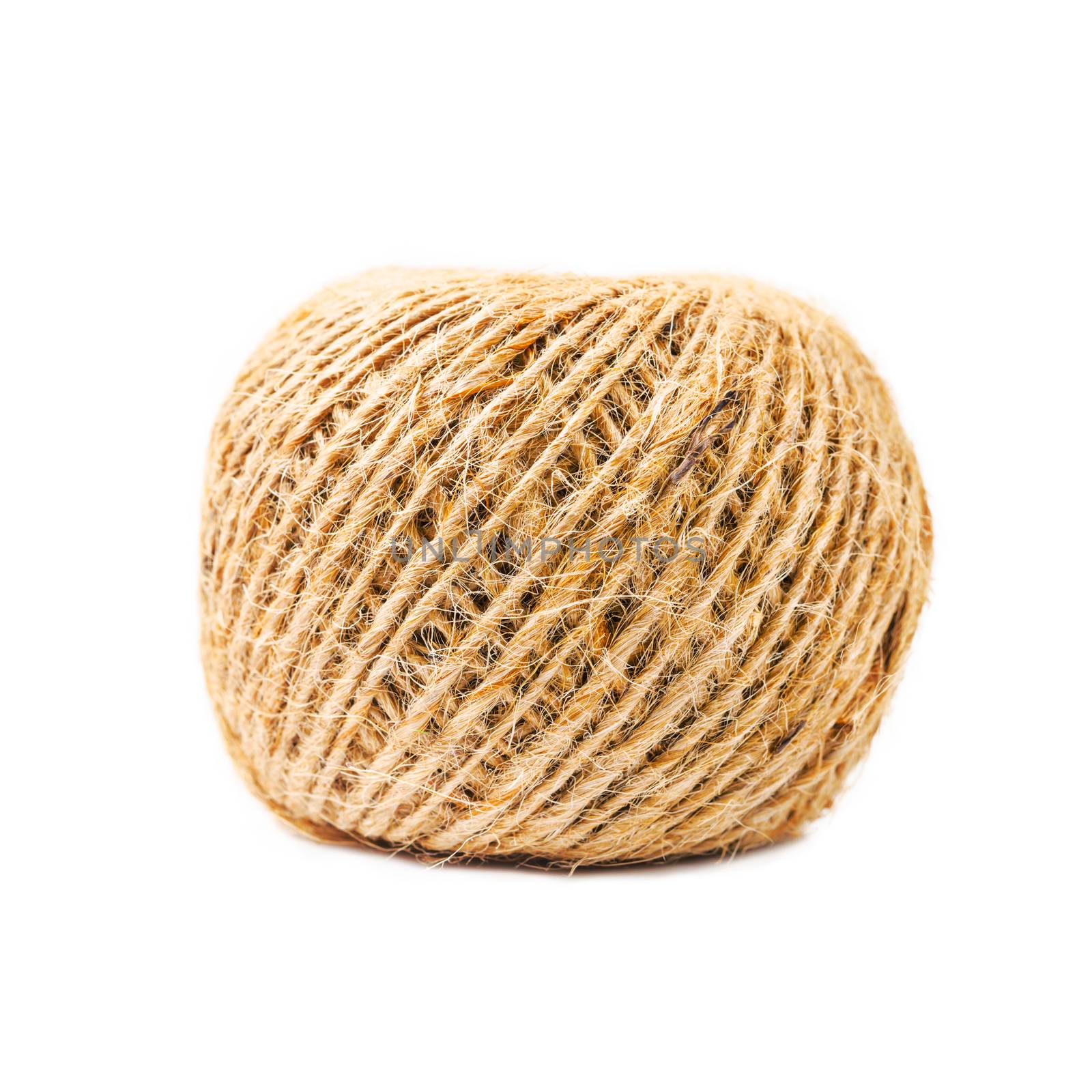 Hemp rope roll isolated on white. by Gamjai