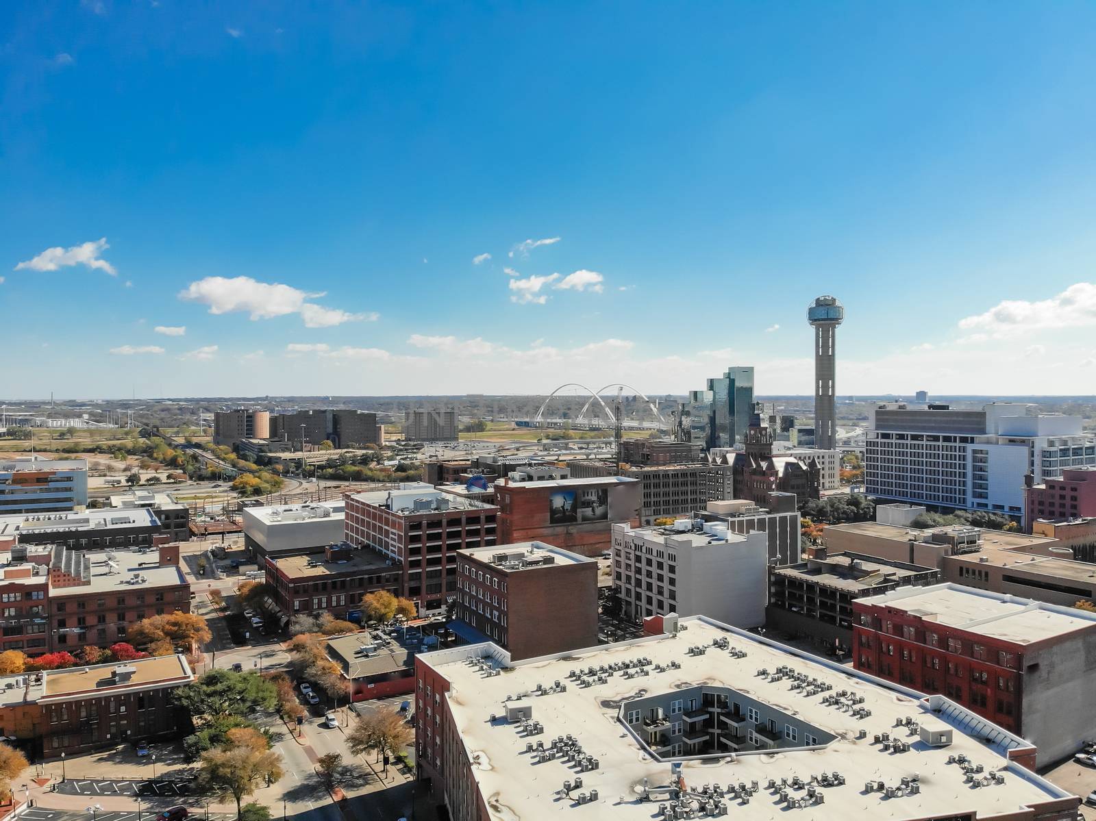 Aerial view uptown Dallas with Margaret McDermott Bridge in back by trongnguyen