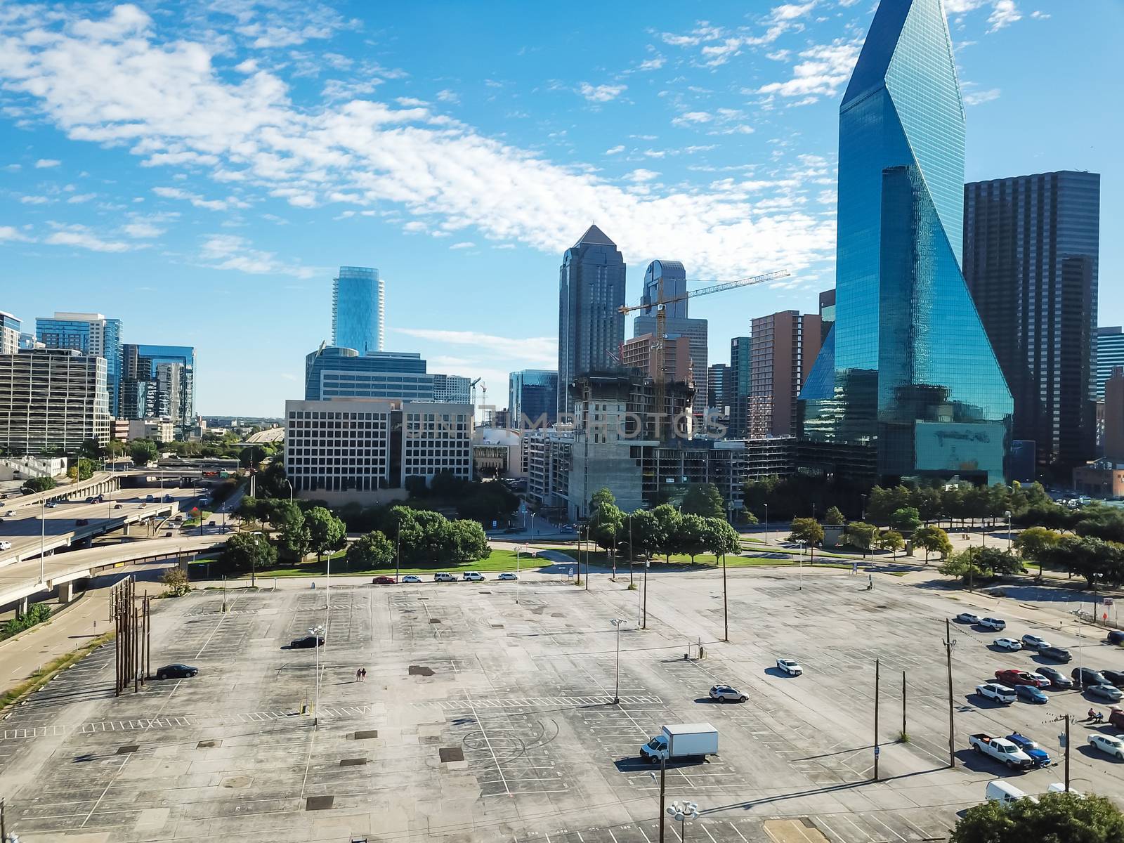 Top view vacant parking lots with downtown Dallas skylines in ba by trongnguyen