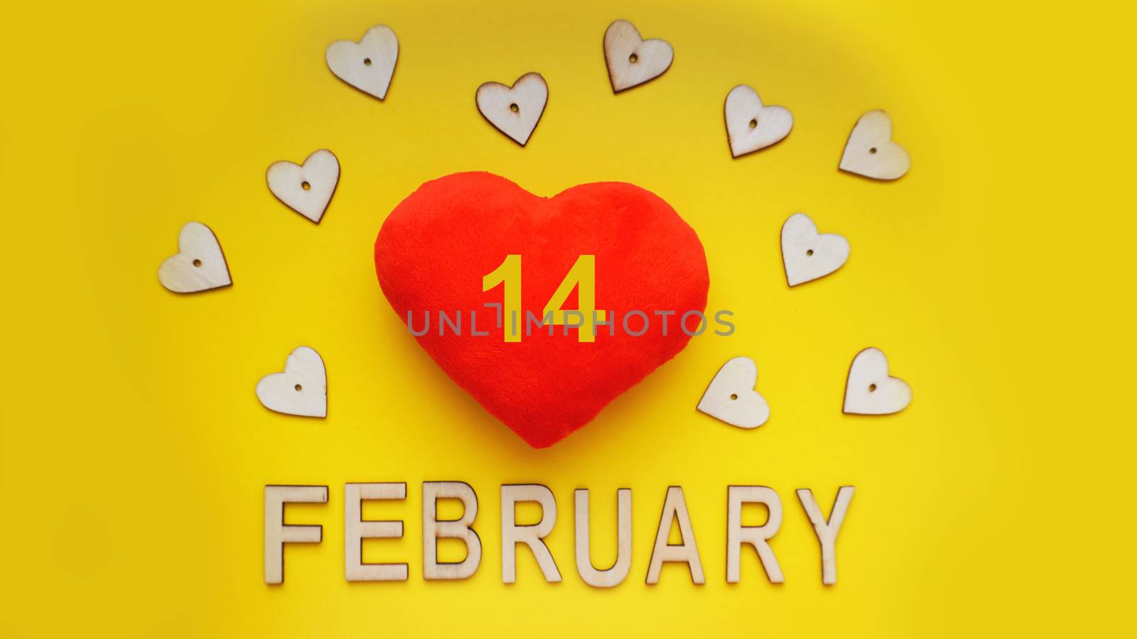 Valentines day background with hearts on yellow background - 14 february. Top view. For banner, cards design