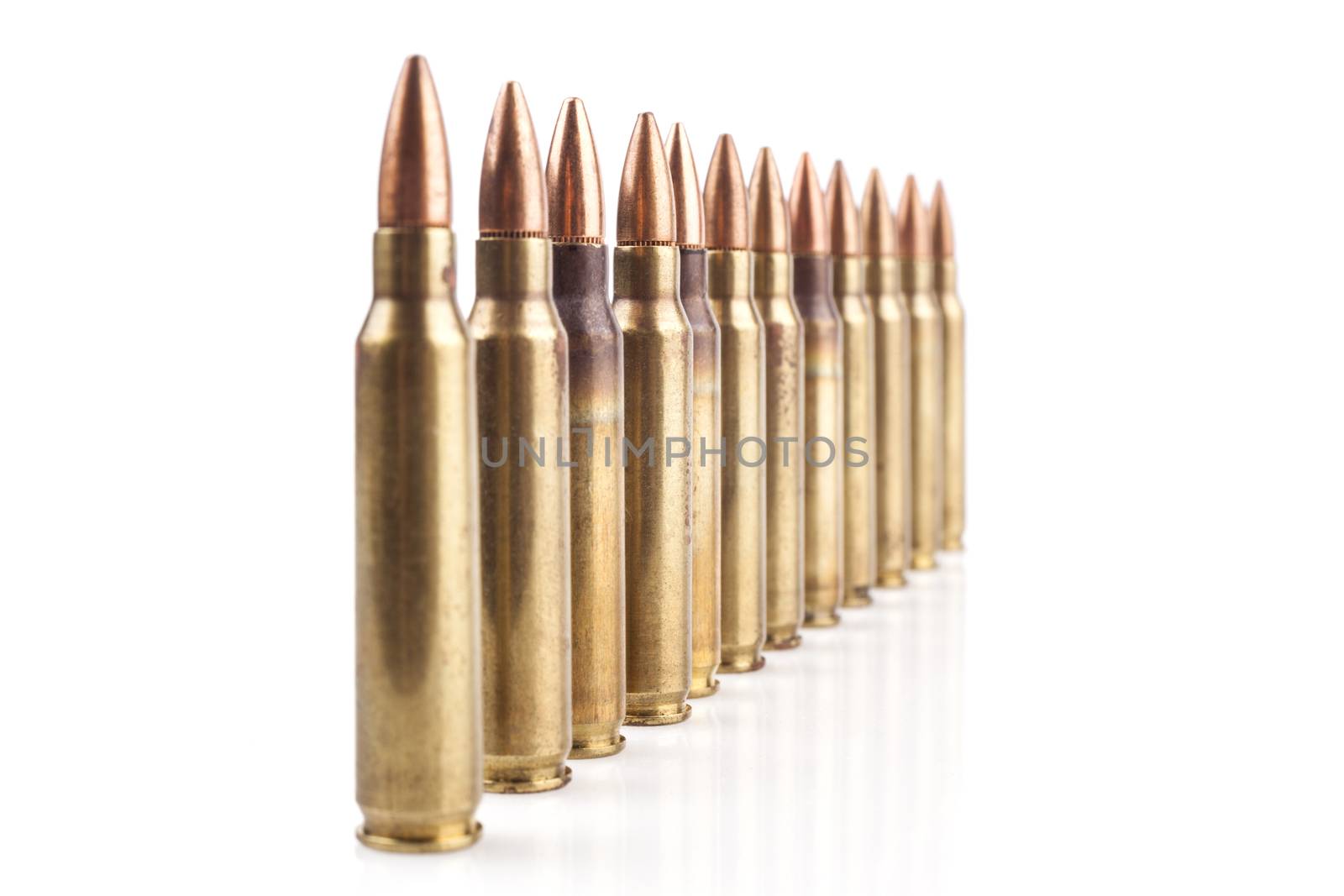 Row of  Isolated Bullets On White Background With Reflection