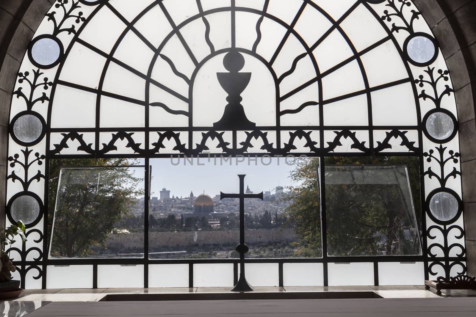 View of Jerusalem city trough a window of church