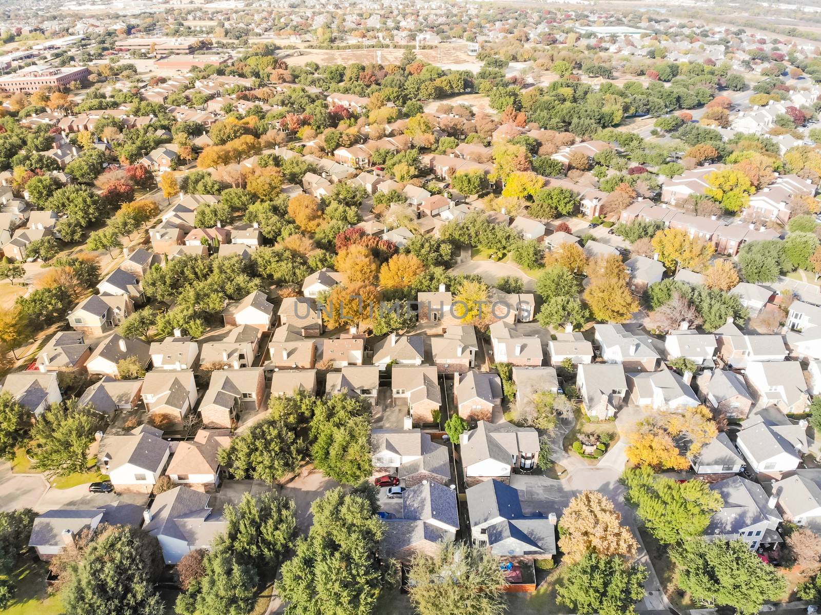 Top view urban sprawl suburbs Dallas during autumn season with c by trongnguyen