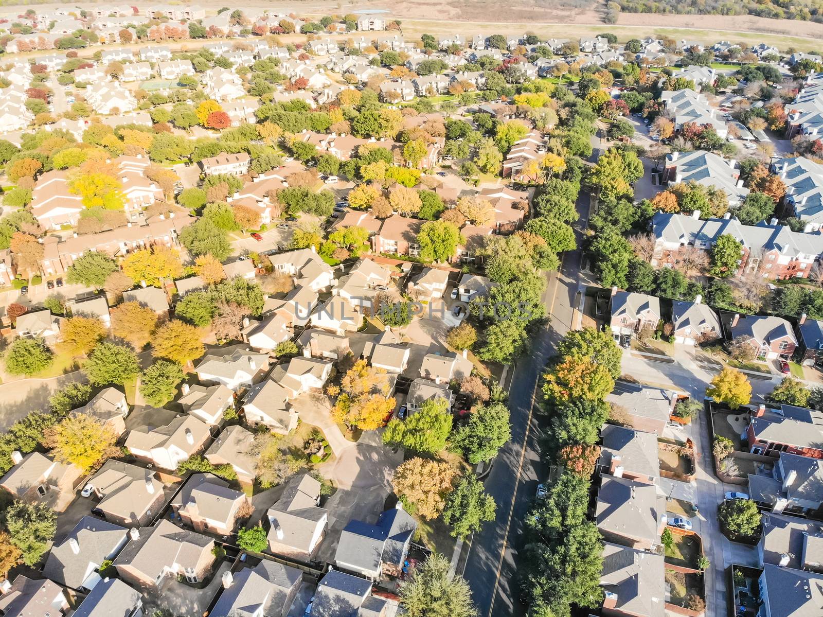 Top view urban sprawl suburbs Dallas during autumn season with c by trongnguyen