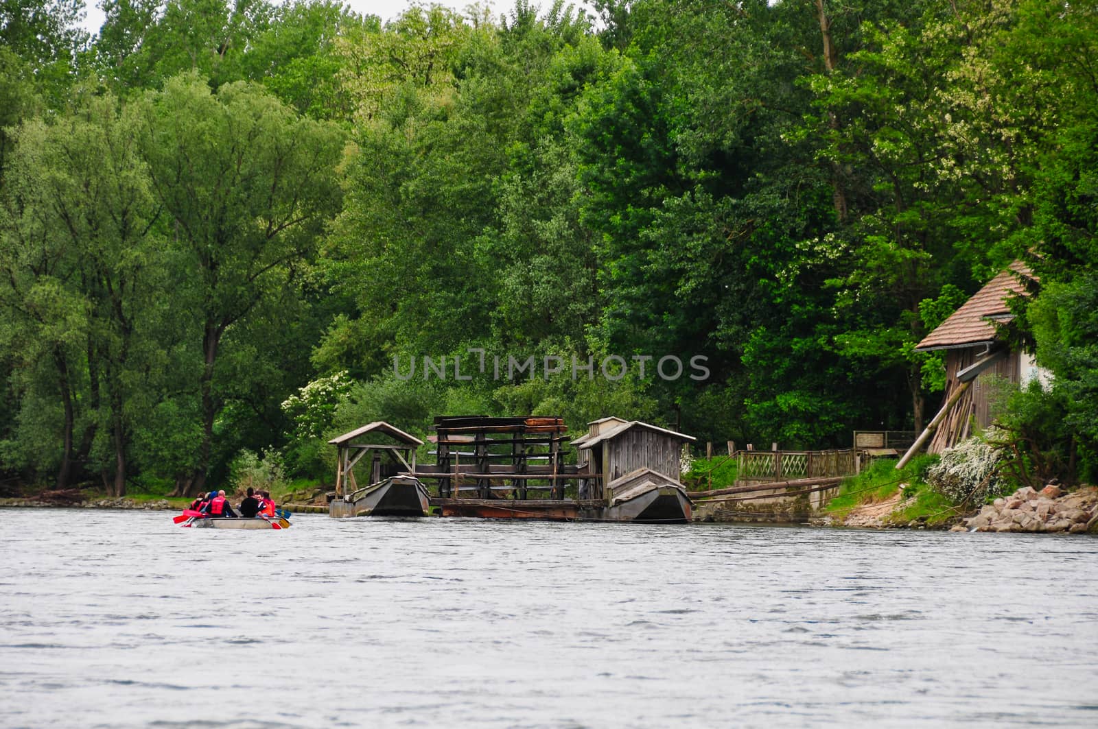 Unique traditional boat mill on a river by asafaric