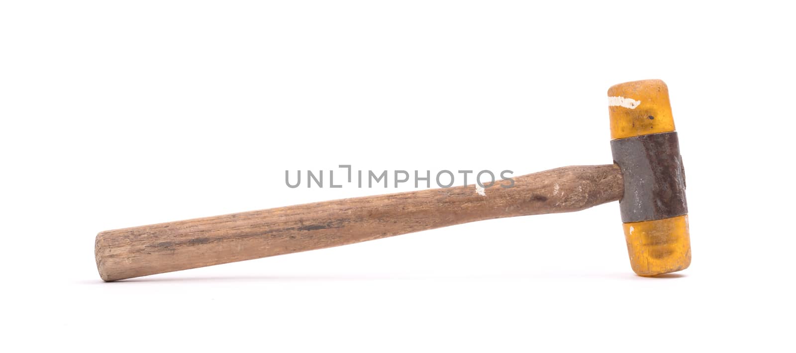 Old wooden hammer isolated on a white background
