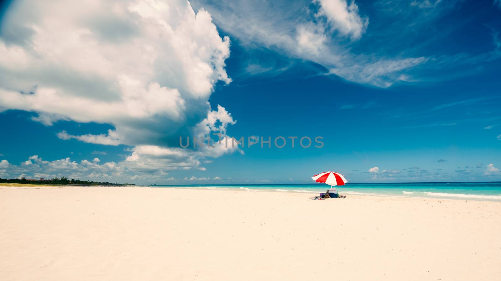 Red umbrella on the tropical beach by Robertobinetti70