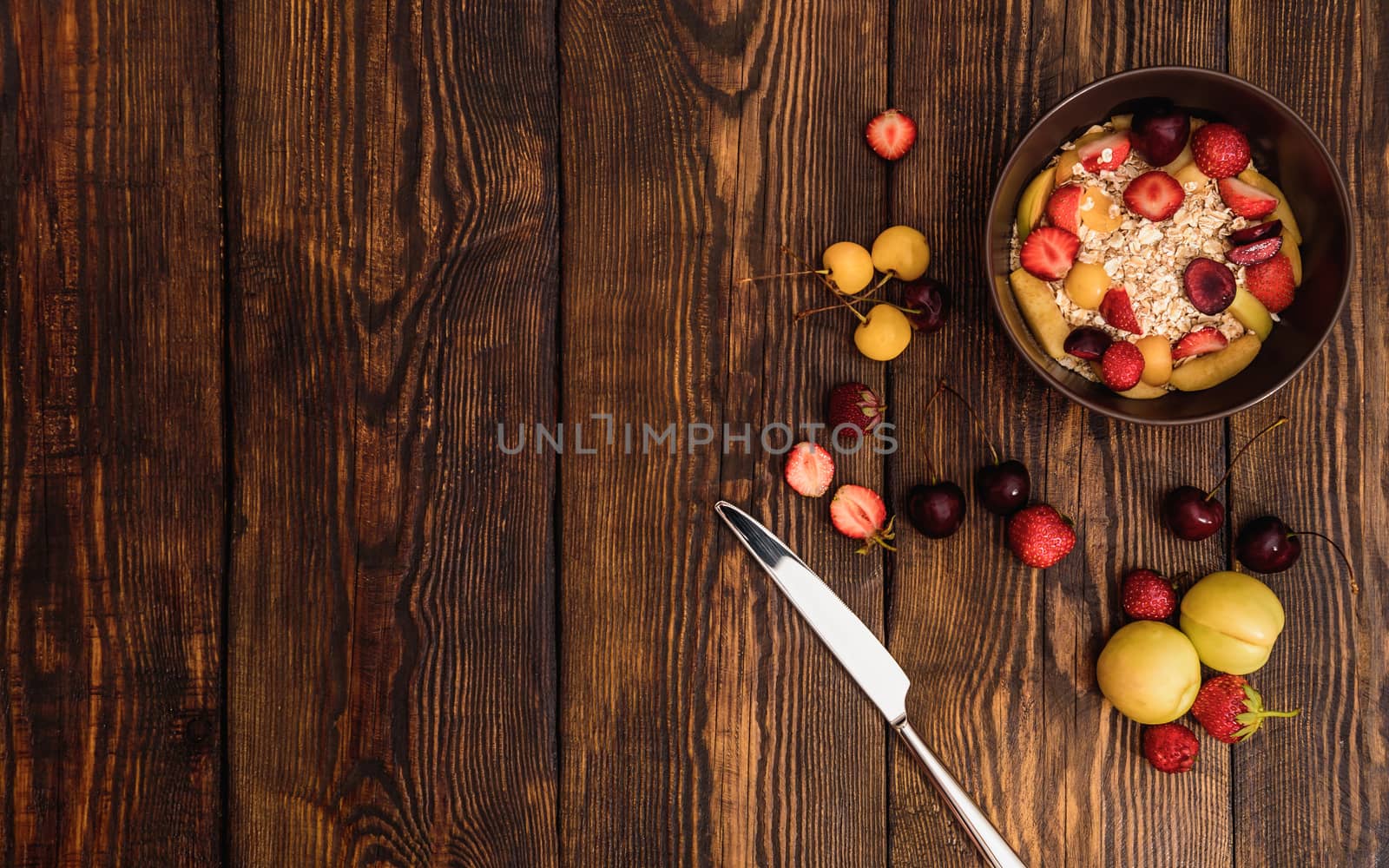 Breakfast with porridge, sweet fruits and berries by Seva_blsv