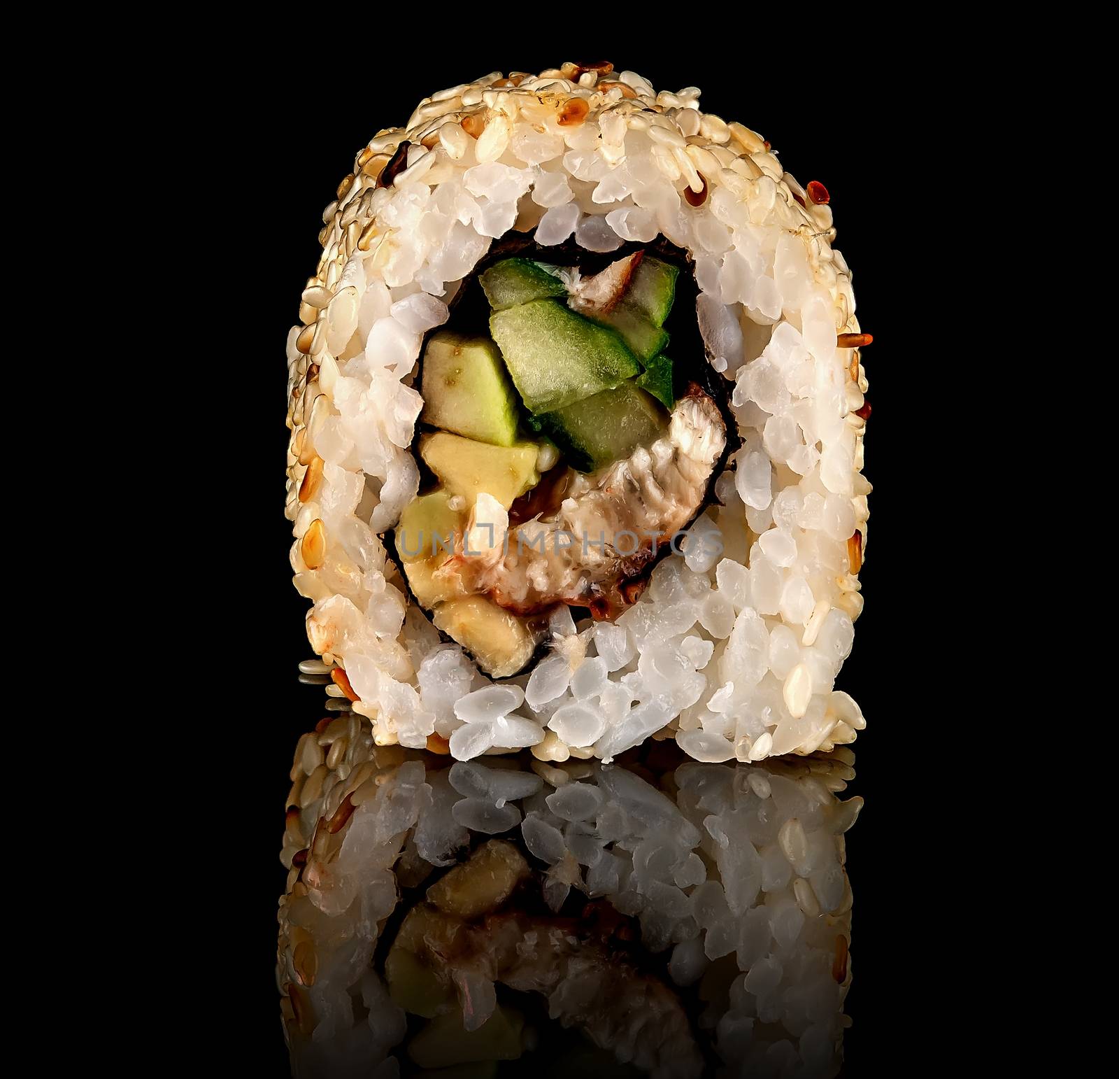 Single sushi roll california rotated. Black background. Reflection