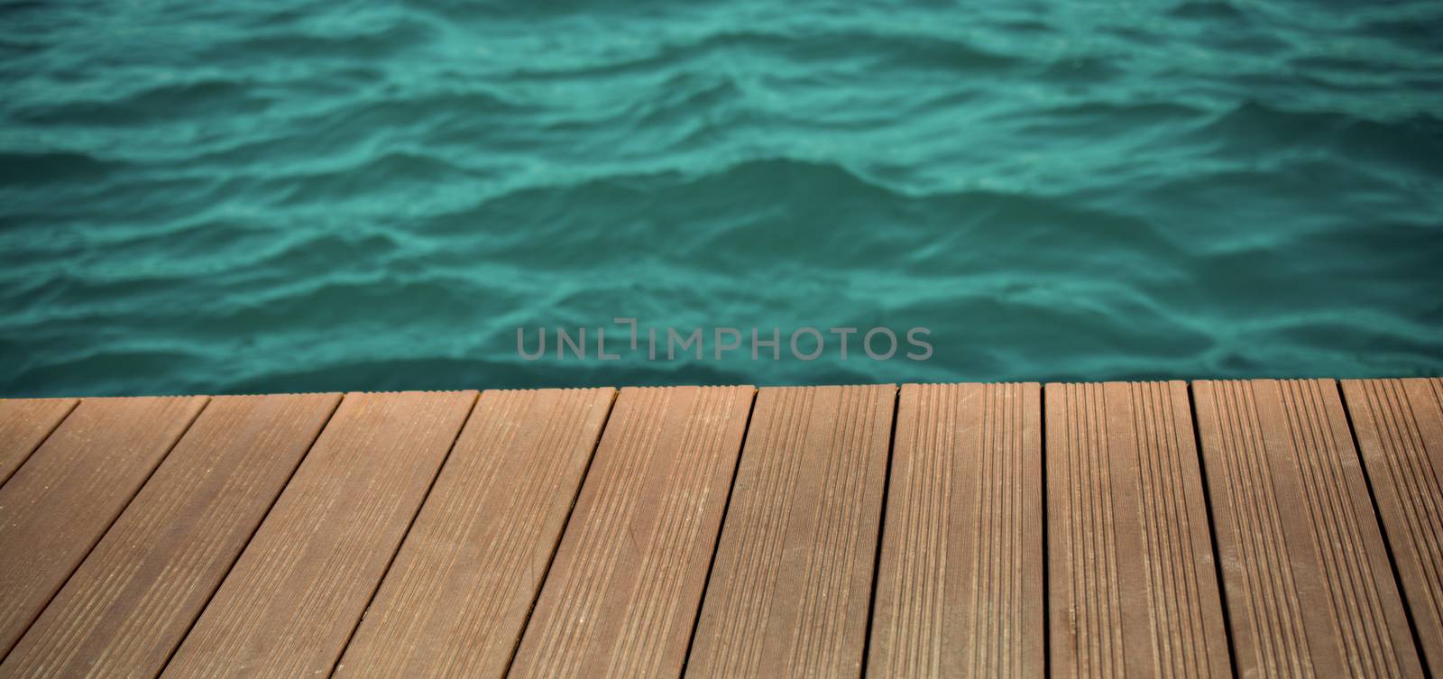 Water and wood texture as a background by berkay