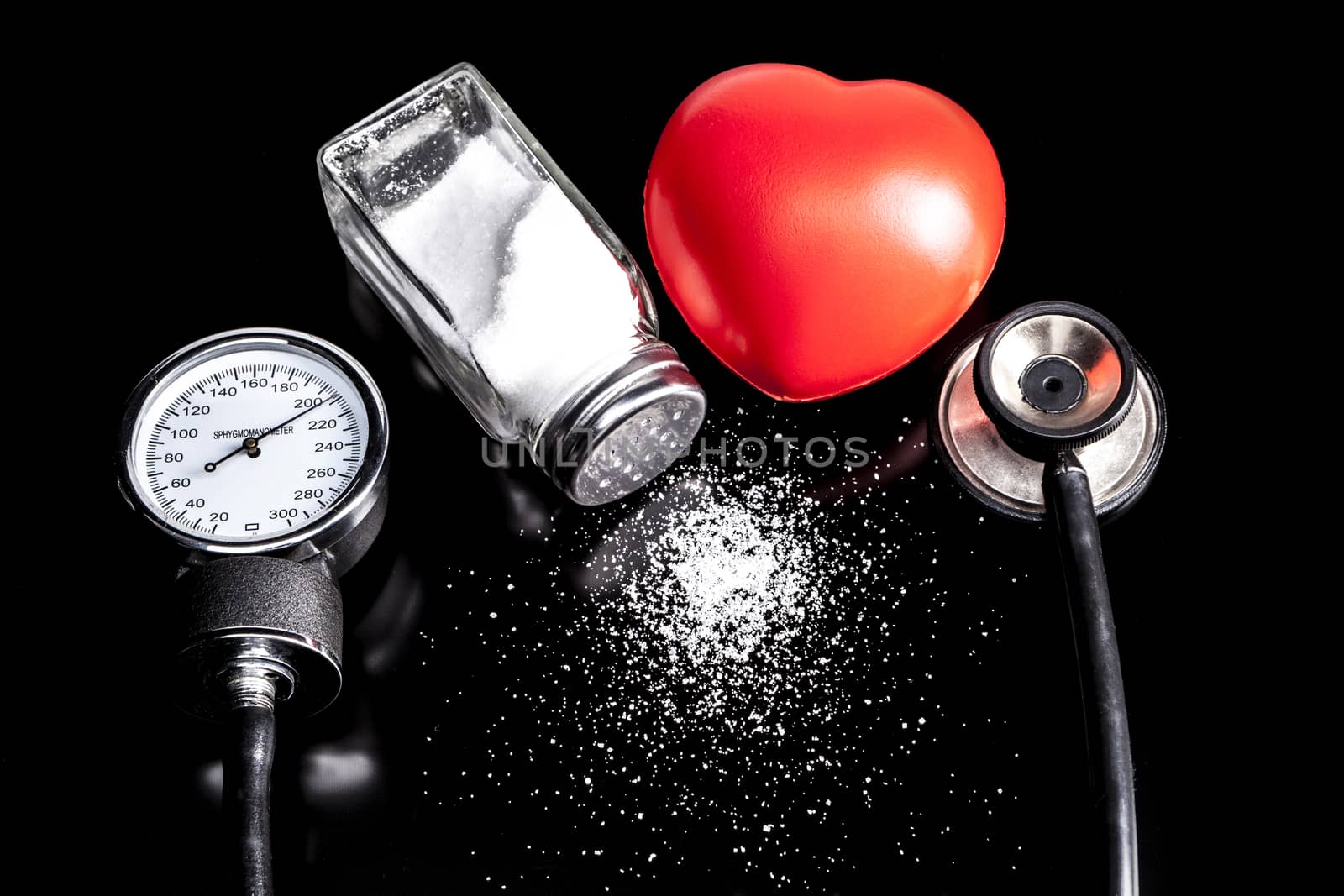 Medical instrument isolated on black background with reflection