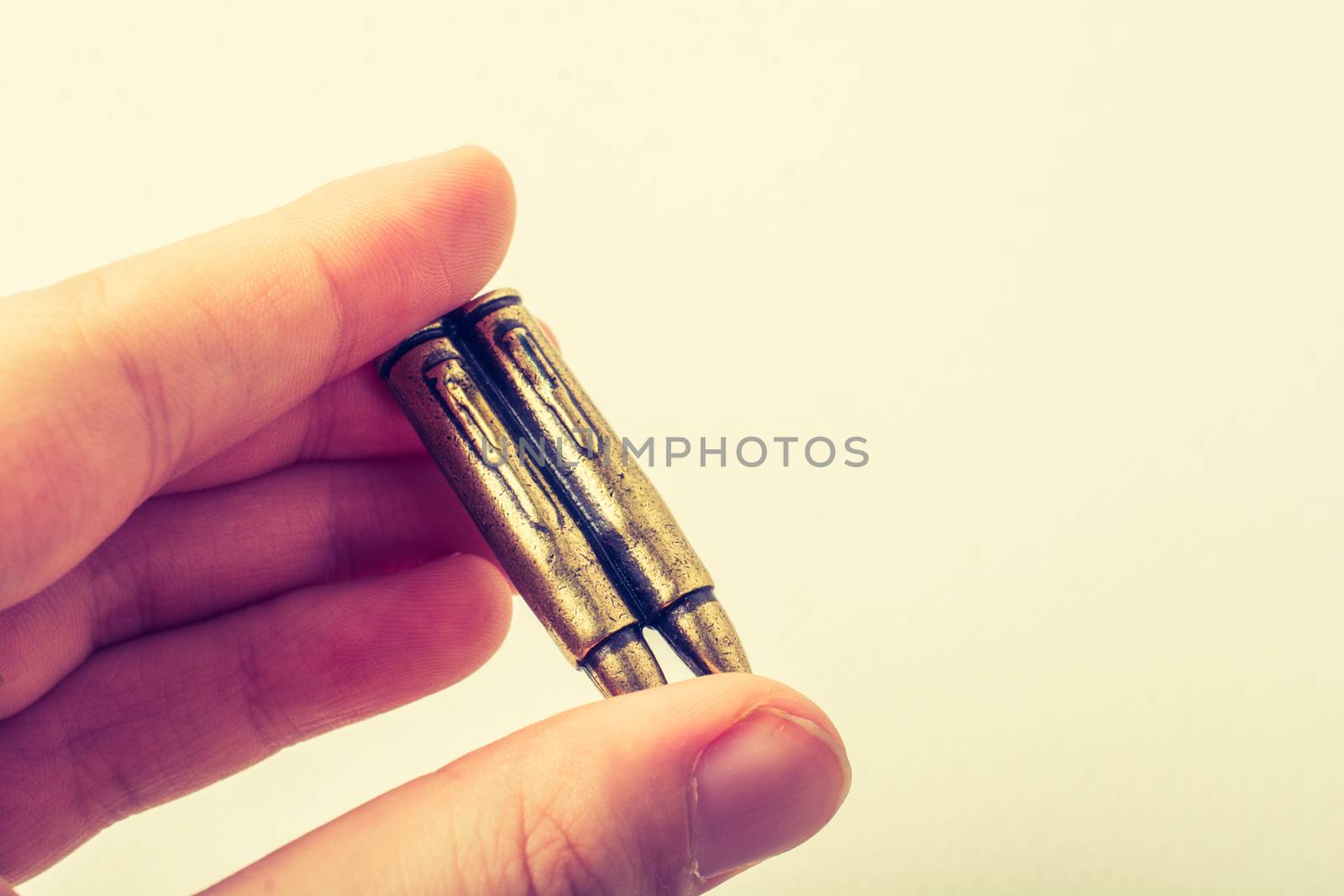 Bullet in the hand as Conceptual photography against the war