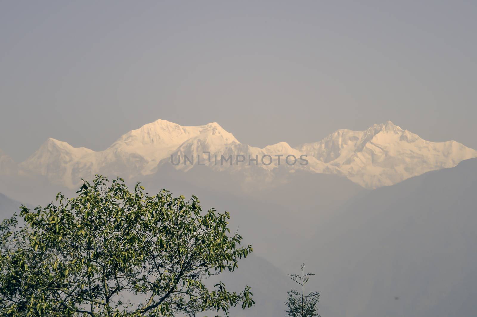 Beautiful view of White snowy tops of Himalayan mountain range in morning. ( Kanchanjungha range from dzongri pass sikkim near Pelling Helipad) Its a popular tourist destination place of north India.