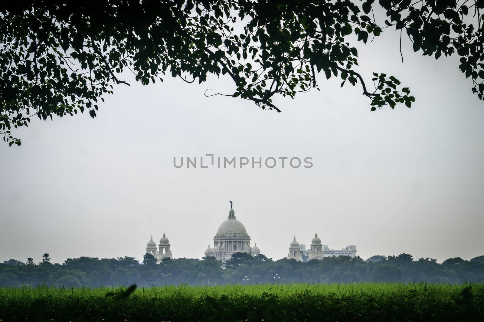 Beautiful image of Victoria Memorial snap from distance, from Moidan, Kolkata , Calcutta, West Bengal, India. A Historical Monument, large marble building dedicated to memory of Queen Victoria.