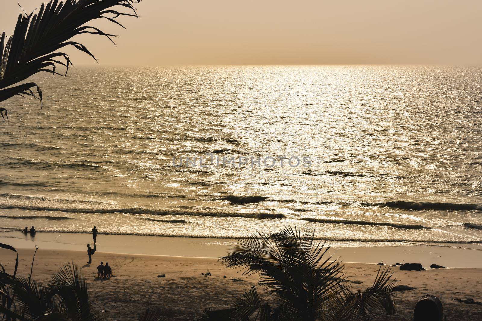 Panorama landscape view of a beautiful tropical sea beach in sunset time during christmas holiday. ( MUMBAI, MAHARASTRA, INDIA). Travel vacation and holiday concept.