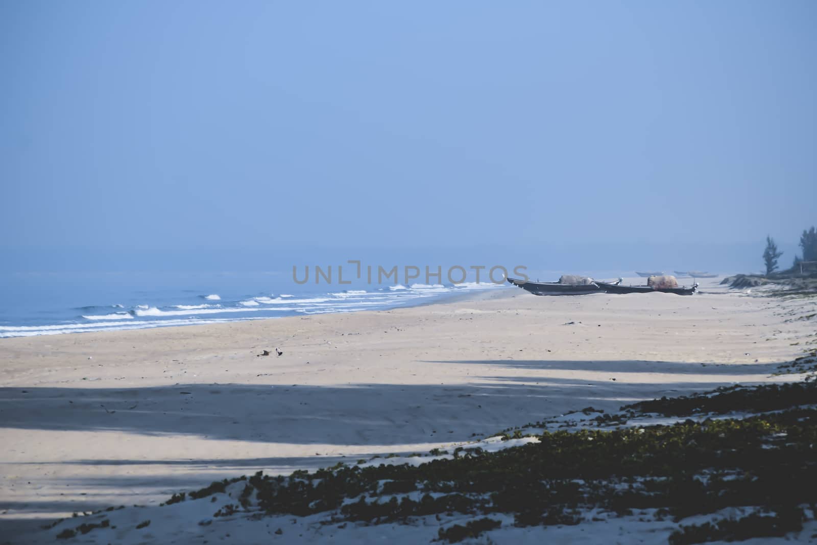 Panorama landscape view of a beautiful tropical sea beach in summertime during christmas holiday. ( MUMBAI, MAHARASTRA, INDIA). Travel vacation and holiday concept.