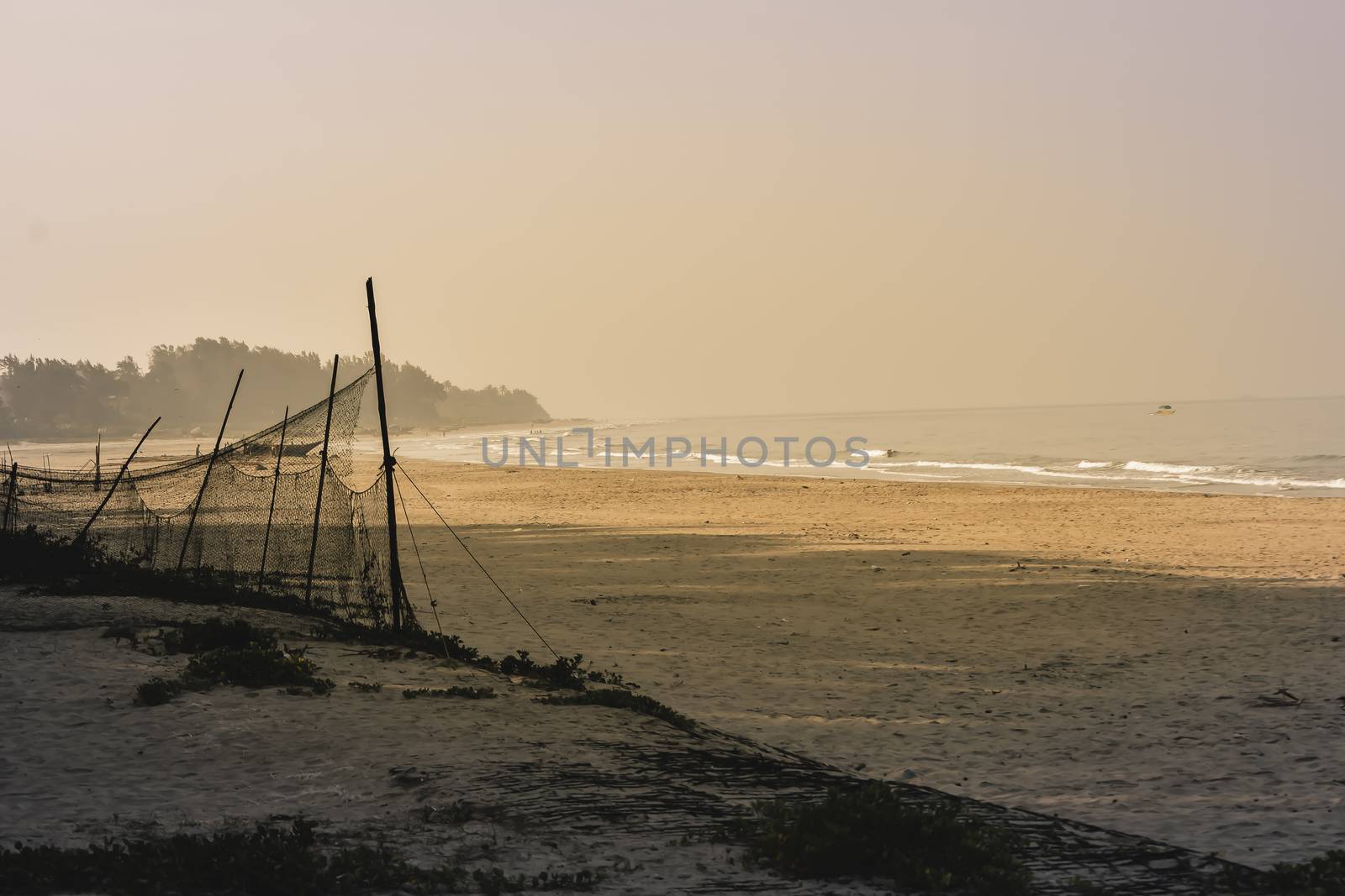 Panorama landscape view of a beautiful tropical sea beach in sunset time during christmas holiday. ( MUMBAI, MAHARASTRA, INDIA). Travel vacation and holiday concept.