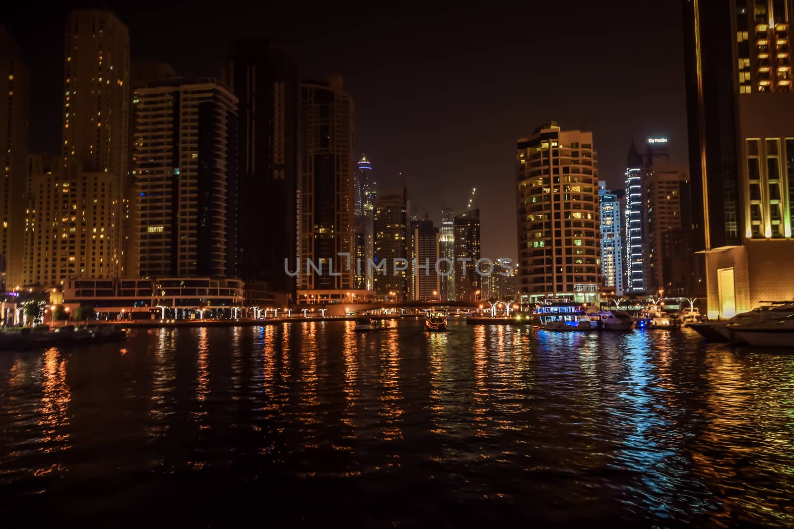 DUBAI, UNITED ARAB EMIRATES - UAE - 23 APRIL 2016: Skyscrapers of Dubai Marina at night. by sudiptabhowmick